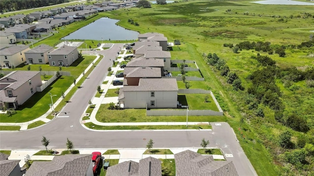 9937 Aqua Miles Path, Wesley Chapel, FL 33545 - aerial perspective of suburban area featuring a large body of water