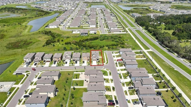 9937 Aqua Miles Path, Wesley Chapel, FL 33545 - aerial view of residential area with a large body of water