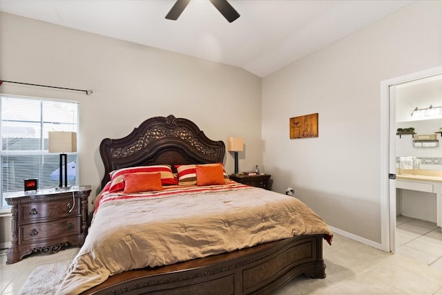 1716 Westerly Dr, Brandon, FL 33511 - bedroom with light tile patterned flooring, vaulted ceiling, connected bathroom, and a ceiling fan