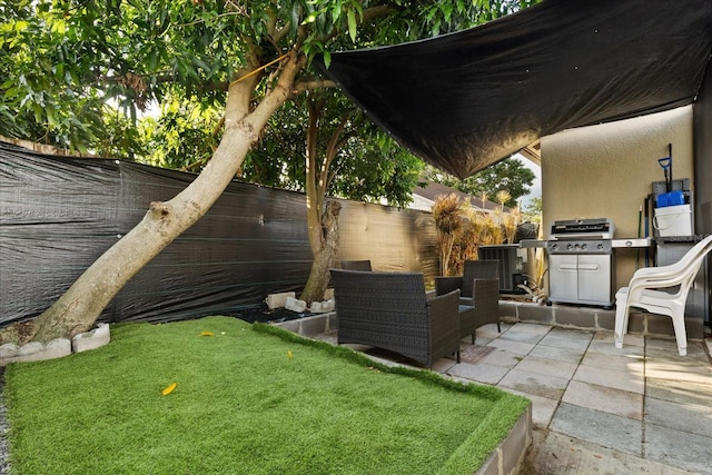 1716 Westerly Dr, Brandon, FL 33511 - view of patio featuring a grill