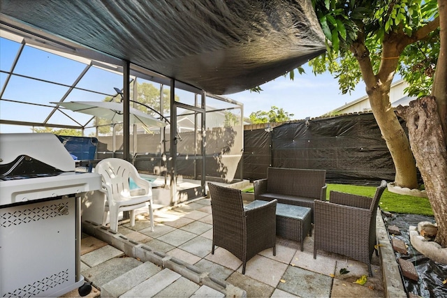 1716 Westerly Dr, Brandon, FL 33511 - fenced backyard featuring a patio area, an outdoor living space, a lanai, and a grill