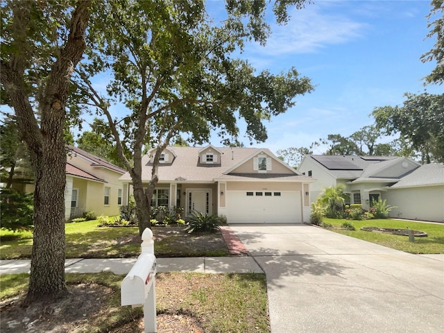 16006 Stags Leap Dr, Lutz, FL 33559 - view of front of property with driveway, a garage, and a front yard