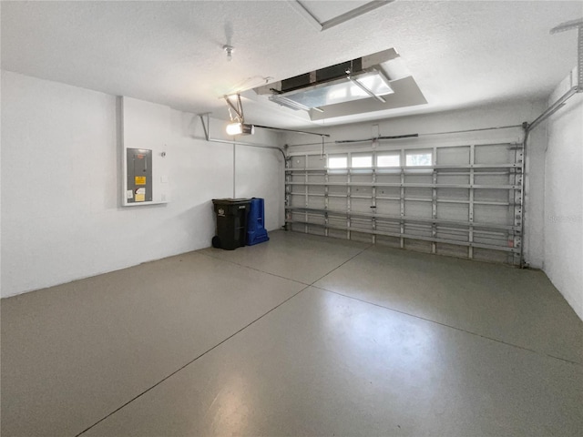 16006 Stags Leap Dr, Lutz, FL 33559 - garage featuring electric panel and a garage door opener