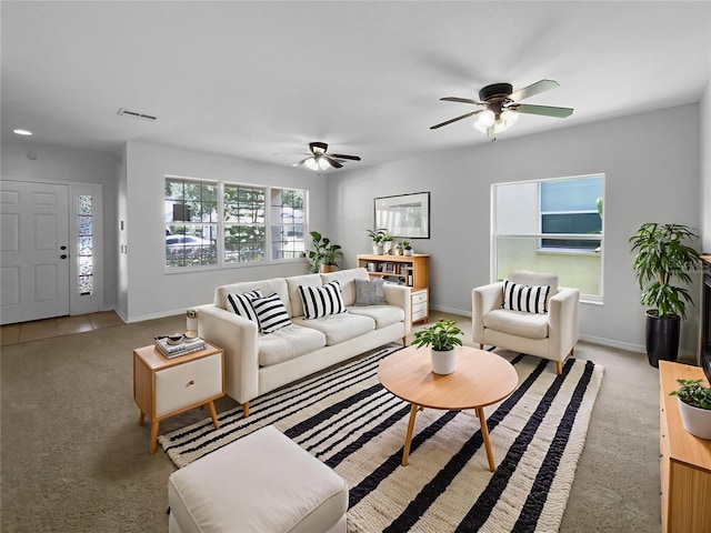 16006 Stags Leap Dr, Lutz, FL 33559 - carpeted living area with baseboards and ceiling fan