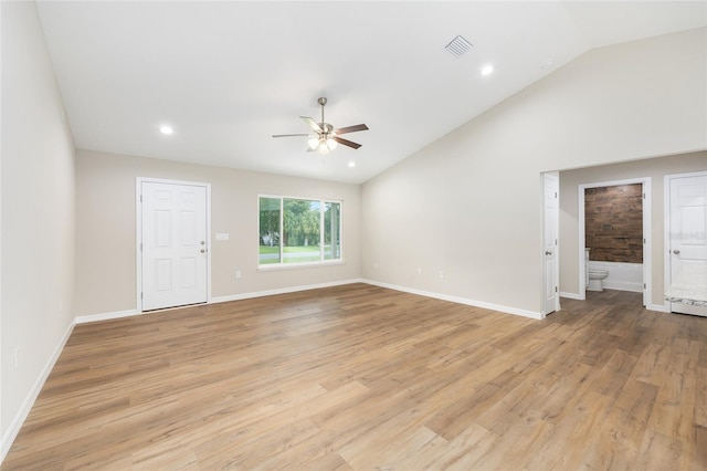1059 NE 130th Ter, Silver Springs, FL 34488 - empty room with ceiling fan, lofted ceiling, light wood-style floors, and recessed lighting