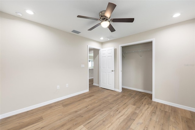 1059 NE 130th Ter, Silver Springs, FL 34488 - unfurnished bedroom with light wood-type flooring, a closet, recessed lighting, and ceiling fan