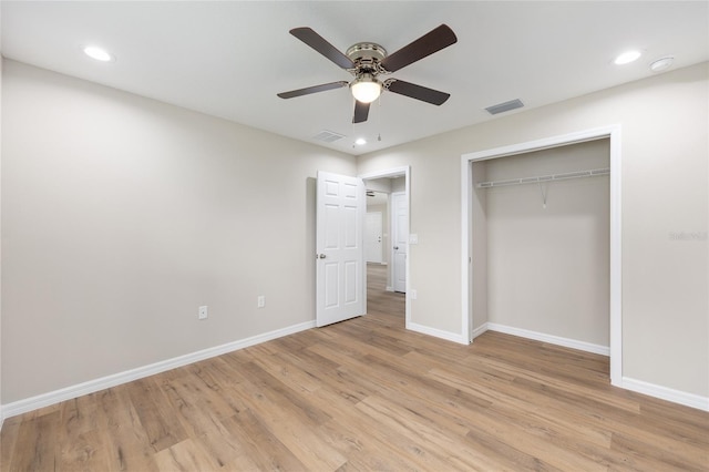 1059 NE 130th Ter, Silver Springs, FL 34488 - unfurnished bedroom with light wood-style flooring, a closet, recessed lighting, and a ceiling fan