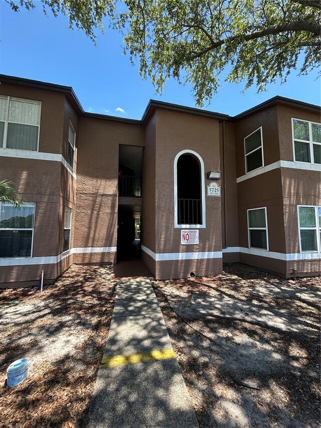 5725 Gatlin Ave Unit 315, Orlando, FL 32822 - view of front of home featuring stucco siding