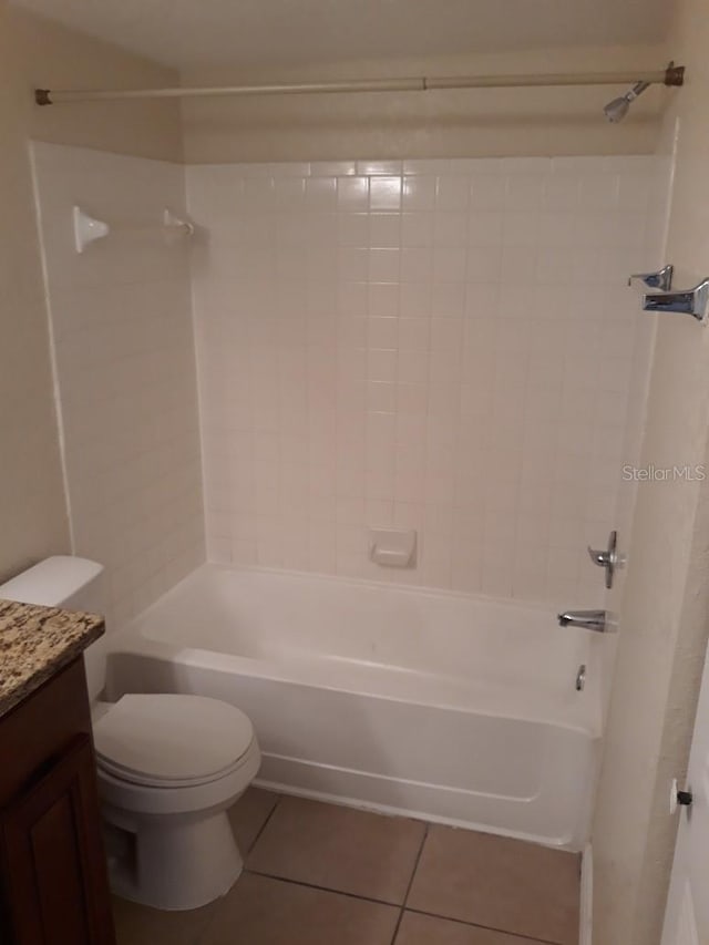 5725 Gatlin Ave Unit 315, Orlando, FL 32822 - full bath with tile patterned flooring, vanity, and shower / bath combination