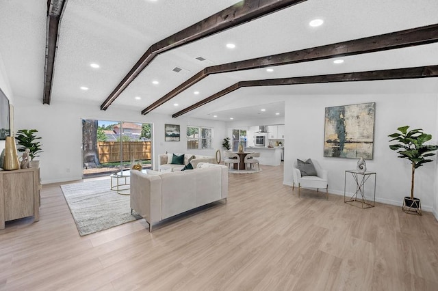 3029 Pinetree, Winter Haven, FL 33884 - living room with recessed lighting and light wood-style flooring