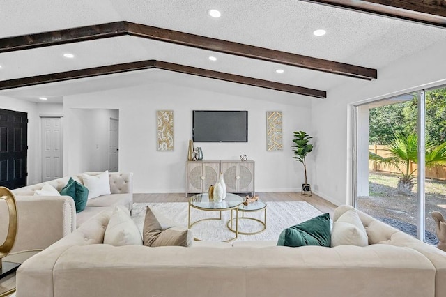 3029 Pinetree, Winter Haven, FL 33884 - living area featuring wood finished floors, recessed lighting, and a textured ceiling