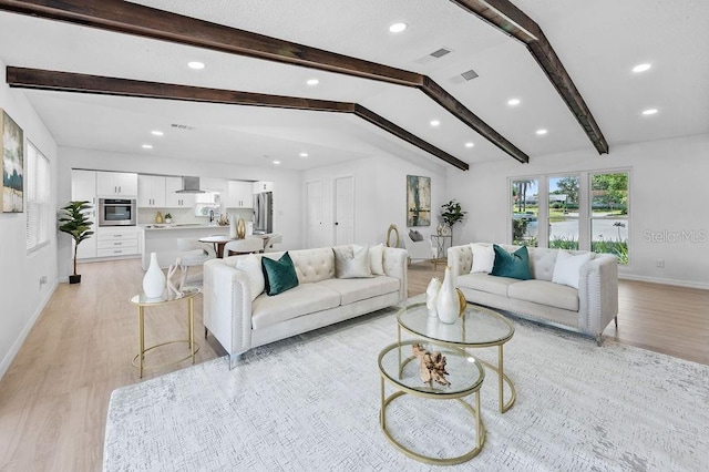 3029 Pinetree, Winter Haven, FL 33884 - living area featuring light wood-style floors and recessed lighting
