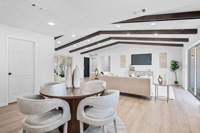 3029 Pinetree, Winter Haven, FL 33884 - dining space featuring light wood finished floors, recessed lighting, and a textured ceiling