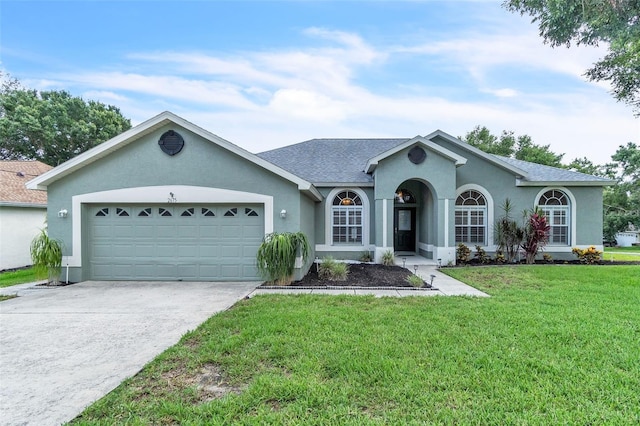 2675 Bond St, Clermont, FL 34711 - ranch-style home with stucco siding, a garage, a front yard, concrete driveway, and roof with shingles