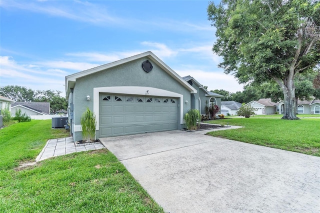 2675 Bond St, Clermont, FL 34711 - view of front of property with a front lawn, driveway, stucco siding, and an attached garage