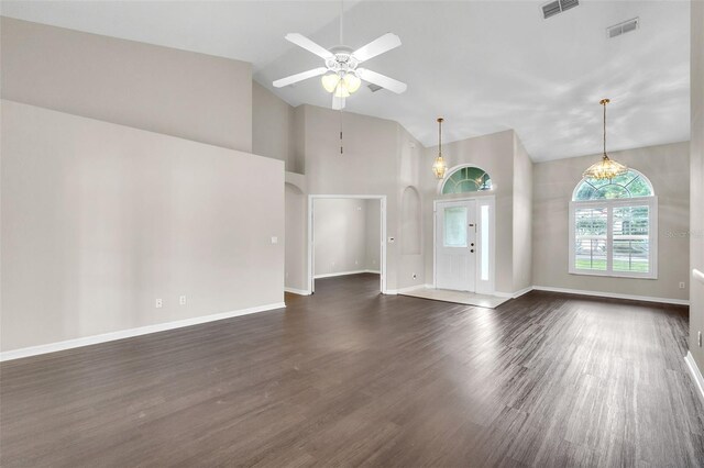 2675 Bond St, Clermont, FL 34711 - unfurnished living room featuring high vaulted ceiling, ceiling fan, and dark wood finished floors