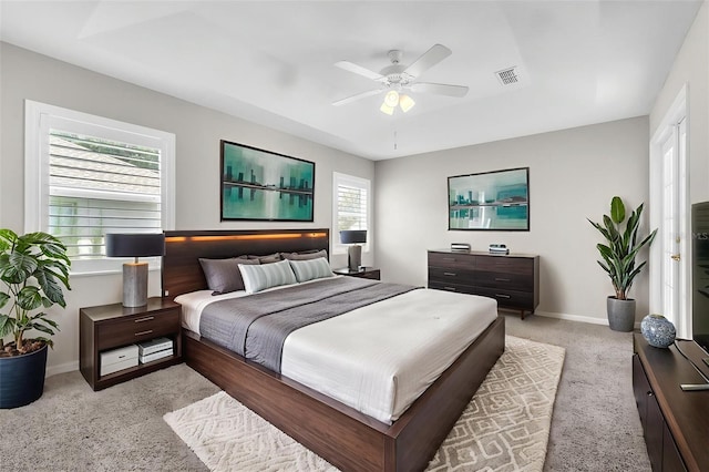 2675 Bond St, Clermont, FL 34711 - bedroom with light carpet and ceiling fan