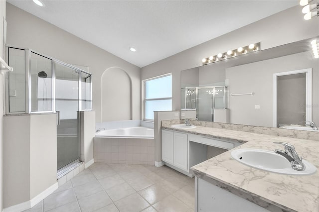 2675 Bond St, Clermont, FL 34711 - full bath featuring double vanity, a garden tub, a stall shower, tile patterned flooring, and recessed lighting
