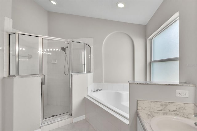 2675 Bond St, Clermont, FL 34711 - full bathroom with a garden tub, a stall shower, and recessed lighting