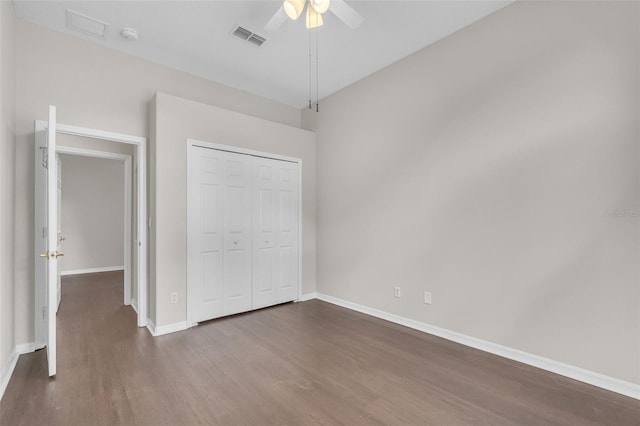2675 Bond St, Clermont, FL 34711 - unfurnished bedroom featuring dark wood-style flooring, a closet, and ceiling fan