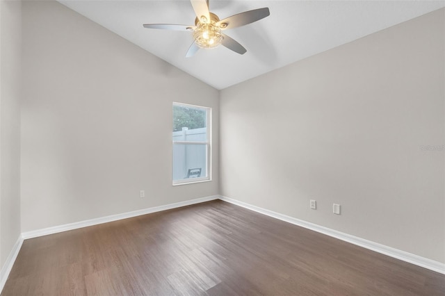 2675 Bond St, Clermont, FL 34711 - spare room featuring dark wood-style floors, ceiling fan, and lofted ceiling