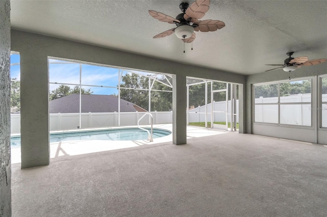 2675 Bond St, Clermont, FL 34711 - view of pool featuring ceiling fan, a fenced backyard, a patio area, and glass enclosure