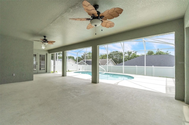 2675 Bond St, Clermont, FL 34711 - view of swimming pool featuring ceiling fan, french doors, a fenced backyard, a patio area, and a lanai