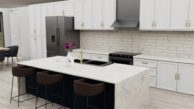 TBD SW 177th St, Ocala, FL 34473 - kitchen with stainless steel refrigerator with ice dispenser, black / electric stove, wall chimney exhaust hood, backsplash, and light wood-style floors