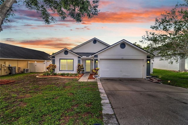 280 Bay St, Apopka, FL 32712 - single story home with stucco siding, an attached garage, and concrete driveway