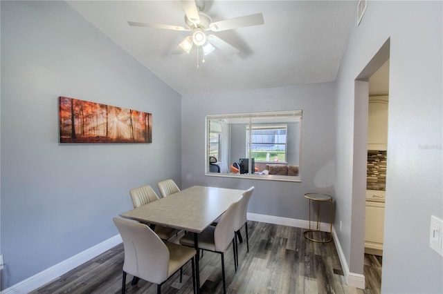 2005 Dalton Ave, Deltona, FL 32725 - dining area featuring vaulted ceiling, wood finished floors, and a ceiling fan