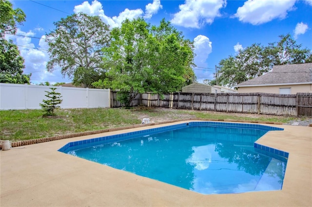 2005 Dalton Ave, Deltona, FL 32725 - view of swimming pool with a patio and a fenced backyard