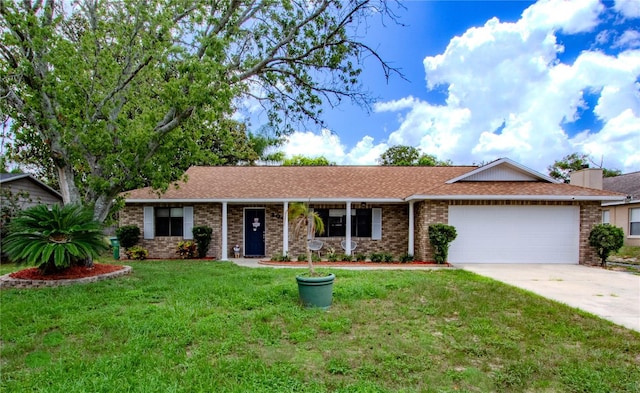 2005 Dalton Ave, Deltona, FL 32725 - single story home with concrete driveway, an attached garage, a front yard, and brick siding