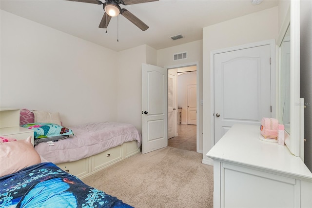 1010 Morvan Ln, Kissimmee, FL 34759 - bedroom with light carpet and ceiling fan