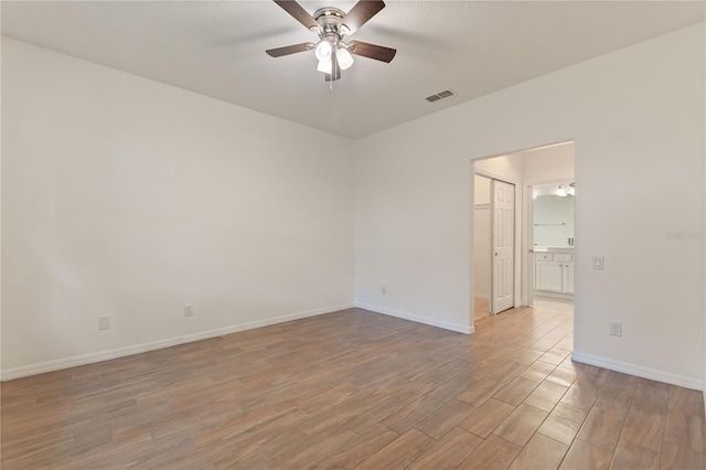519 Cadiz Dr, Davenport, FL 33837 - unfurnished room featuring a ceiling fan and light wood-type flooring