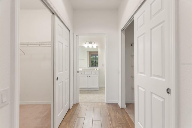 519 Cadiz Dr, Davenport, FL 33837 - corridor with light wood-type flooring