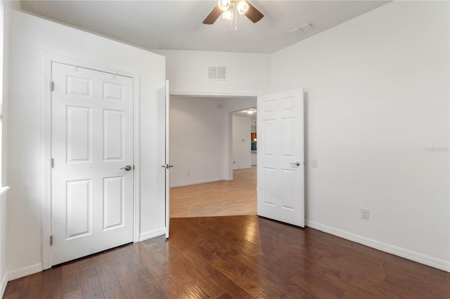 519 Cadiz Dr, Davenport, FL 33837 - unfurnished bedroom with hardwood / wood-style flooring and ceiling fan