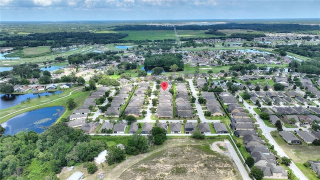519 Cadiz Dr, Davenport, FL 33837 - aerial view of property and surrounding area featuring nearby suburban area and a nearby body of water