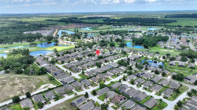 519 Cadiz Dr, Davenport, FL 33837 - aerial view of property's location with a large body of water, nearby suburban area, and a golf club
