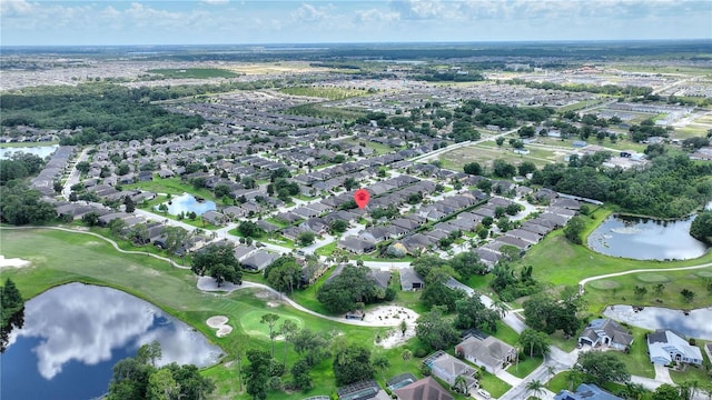 519 Cadiz Dr, Davenport, FL 33837 - aerial view of property and surrounding area with nearby suburban area and a local golf course