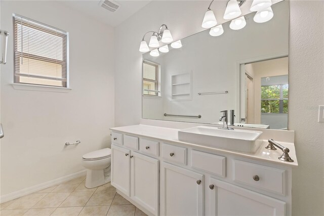 519 Cadiz Dr, Davenport, FL 33837 - bathroom with vanity and tile patterned flooring