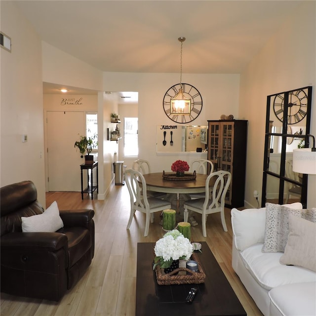 2480 Tahoe Cir Unit 2480, Winter Park, FL 32792 - living area featuring a chandelier and light wood-style flooring