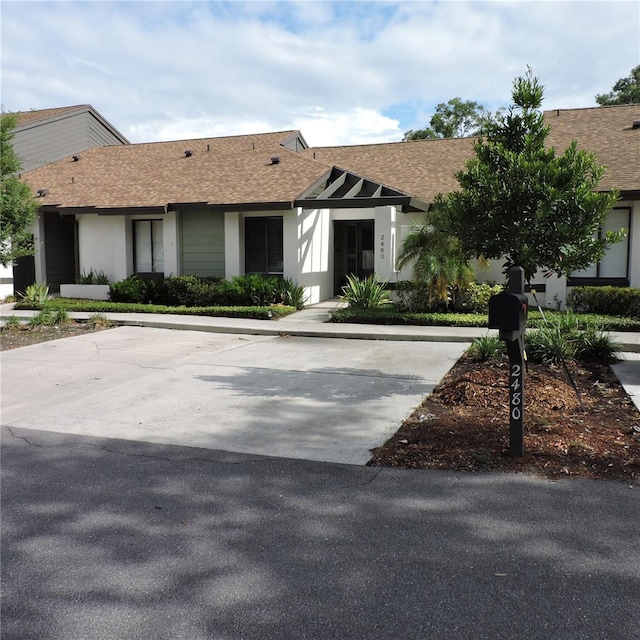 2480 Tahoe Cir Unit 2480, Winter Park, FL 32792 - view of front of house featuring a shingled roof