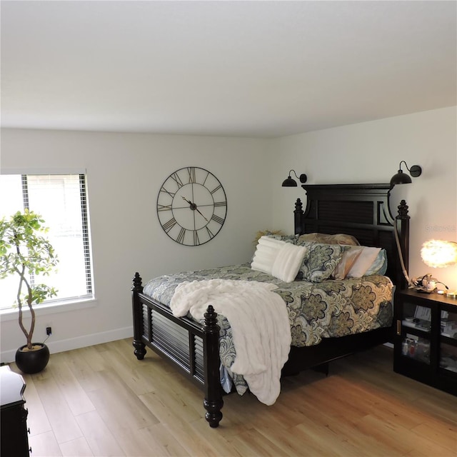 2480 Tahoe Cir Unit 2480, Winter Park, FL 32792 - bedroom featuring light wood finished floors and baseboards