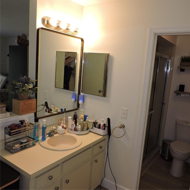 2480 Tahoe Cir Unit 2480, Winter Park, FL 32792 - bathroom featuring a stall shower, vanity, and wood finished floors