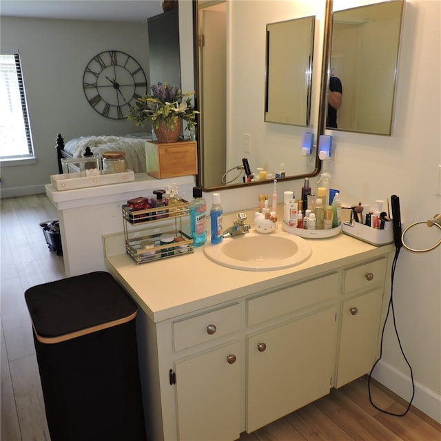 2480 Tahoe Cir Unit 2480, Winter Park, FL 32792 - bathroom with vanity and wood finished floors