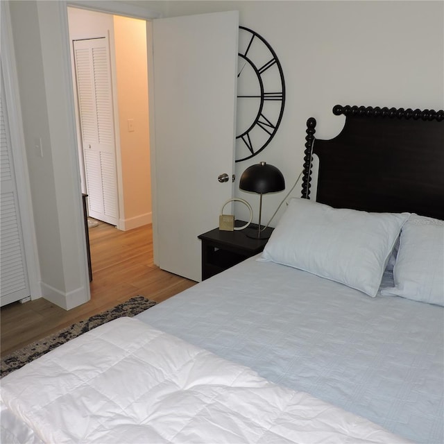 2480 Tahoe Cir Unit 2480, Winter Park, FL 32792 - bedroom featuring wood finished floors and baseboards