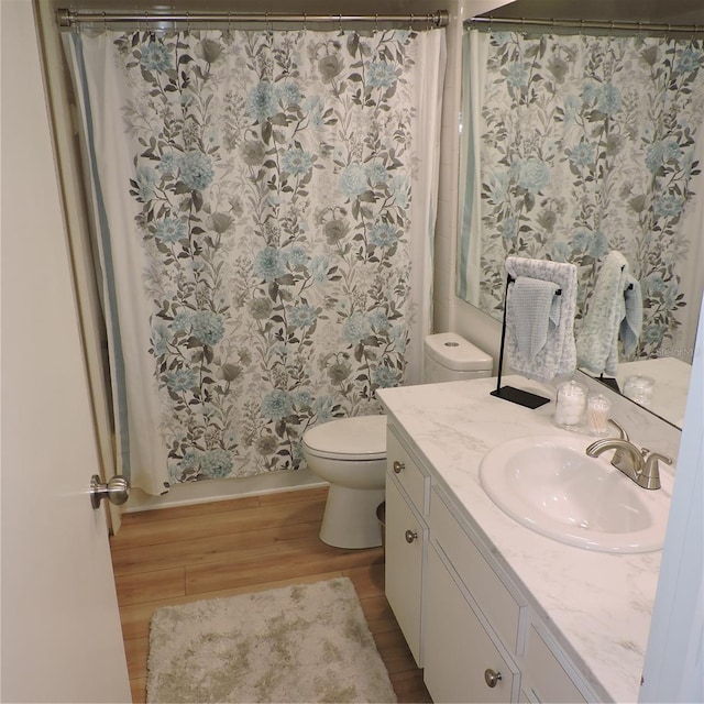 2480 Tahoe Cir Unit 2480, Winter Park, FL 32792 - full bath with vanity, wood finished floors, and a shower with shower curtain