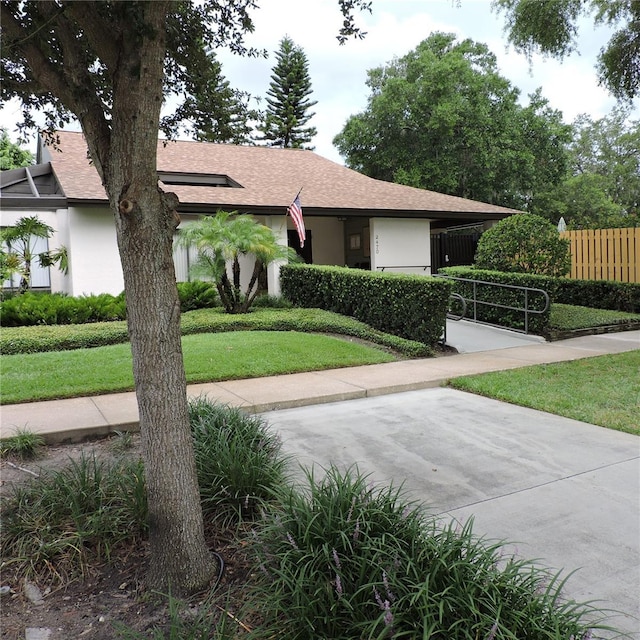 2480 Tahoe Cir Unit 2480, Winter Park, FL 32792 - view of front facade with stucco siding and roof with shingles
