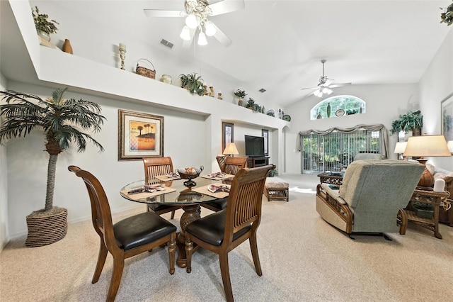 1430 Challenger Ave, Davenport, FL 33897 - dining space featuring a ceiling fan, light carpet, and high vaulted ceiling