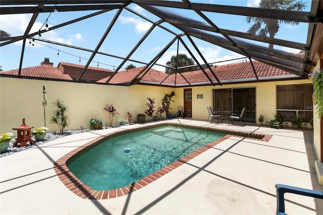 5057 Maui Cir Unit 15, Orlando, FL 32808 - outdoor pool with a patio and a lanai